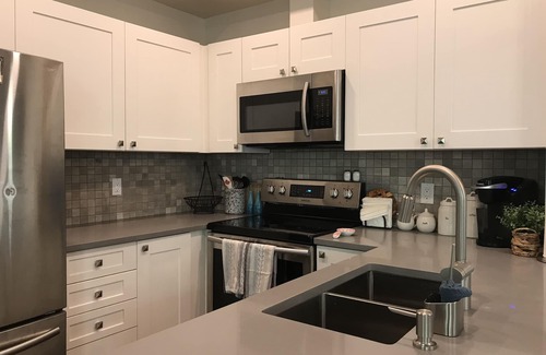 Village North Condo | Home away from Home! Bright, updated Pet Friendly corner unit.