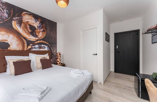 Historical Center Bruges Hotel | Homer Simpson's Donut Room - Steps from the Belfry