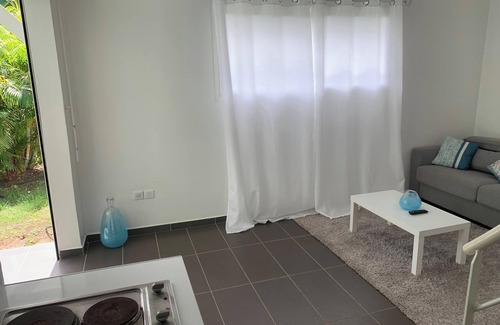 L'Autre-Bord Apartment | Homerez - Charming Apartment Le Moule 60m² + Pool