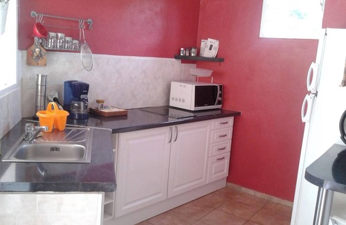 Doubs Apartment | Homerez - Cosy Studio in Les Abymes