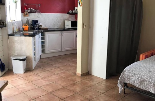 Doubs Apartment | Homerez - Cosy Studio in Les Abymes