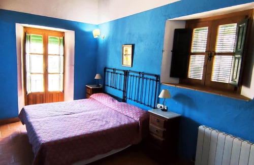 Zahara de la Sierra House | Homerez - House for 12 ppl. with shared pool and garden at Zahara de la Sierra