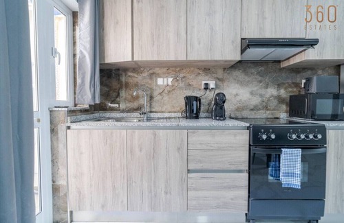 Tarxien Apartment | Homey 1BR Apartment in Tarxien with Sofa Bed & AC