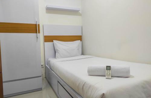Panakkukang Apartment | Homey and Comfy 2BR at Vida View Apartment By Travelio