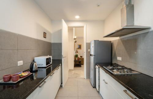 Sector 58 Apartment | Hostie Enigma - luxury 2BR apt near Golf Course Road
