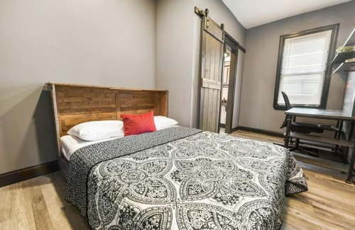 Lawrenceville House | HostWise Stays - Prime Location in Lawrenceville, Exposed Brick 2BR Home