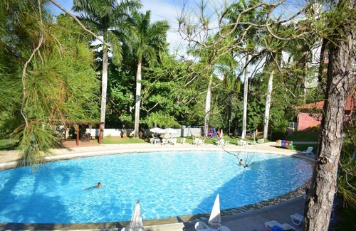 Prive das Caldas Apartment | Hot Springs apartment with bathtub and 24h pool access