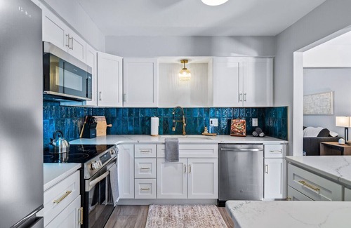 Northwest Akron Apartment | *Hot Tub, Game Room, 4 Bedrooms, Gorgeous Remodel*