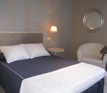 Cue Hotel | Hotel Migal