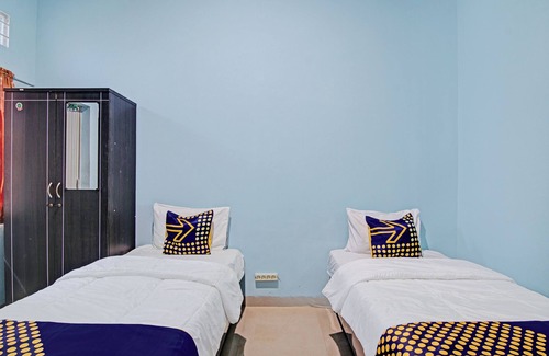 Pekanbaru Hotel | Hotel O Penginapan Puti SyariahNearBandara Sultan Syarif Kasim II