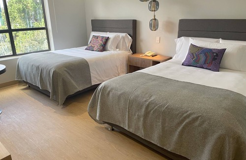 Chico Norte III Hotel | Hotel Parque 97 Suites