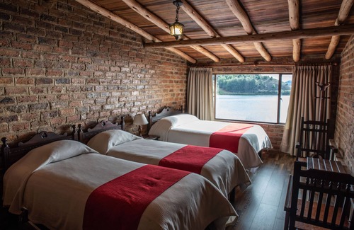 Aquitania Hotel | Hotel refugio pozo azul