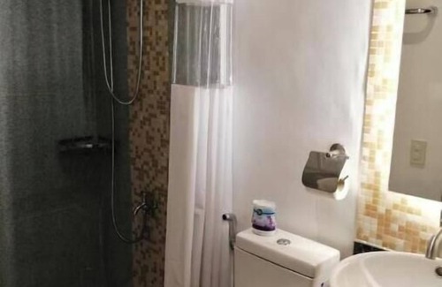 Baler Hotel | Hotel Rupert Atienza - Deluxe Room Twin Bed 1