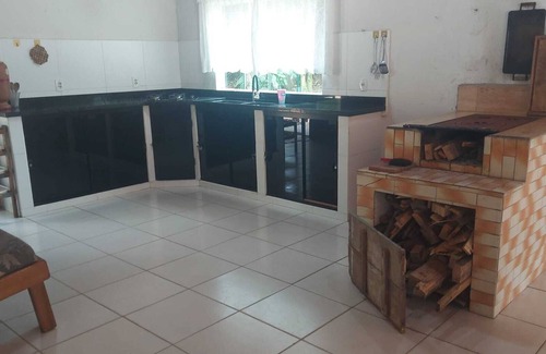 Guaratuba House | House facing the beautiful São João river, surrounded by nature.