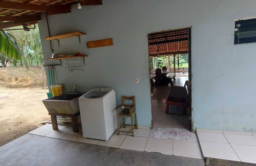 Guaratuba House | House facing the beautiful São João river, surrounded by nature.