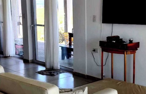 Nueva Cordoba House | House by the lake Puerto del Aguila inbalo 01