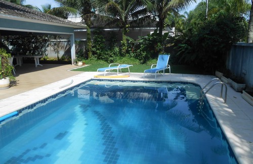 Guaruja House | House in Condominium with 4 Suites, Air Conditioning, Swimming Pool, Barbecue and Oven