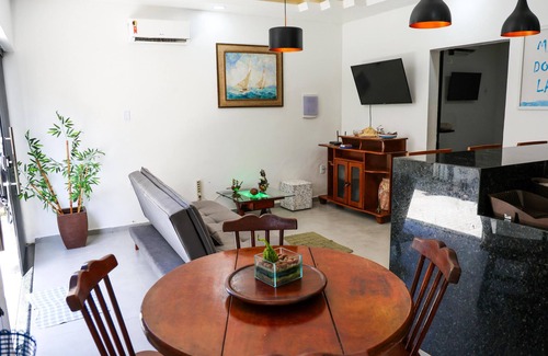 Praia Grande House | House in Praia Dos Anjos, 250m from the beach with air conditioning