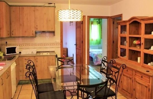 Una Cottage | House the Escalerón I | La Laguna Accommodation. Patio, barbecue and fireplace.