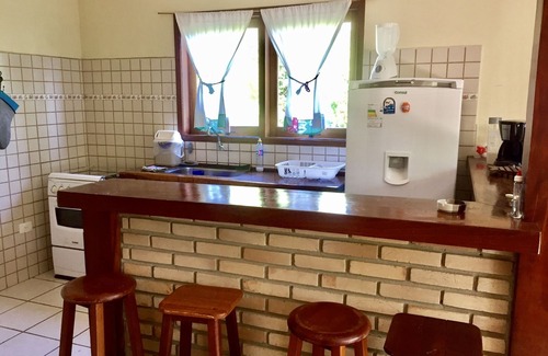 Veloso House | House with 2 bedrooms, living room with kitchen and balcony 80 meters from Curral beach