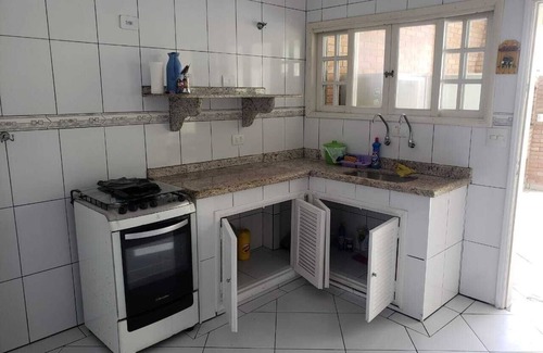 Centro House | House with pool and barbecue well located in Itanhaém.