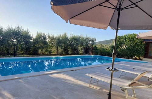 Montecchio House | House with swimming pool and panoramic view surrounded by olive trees