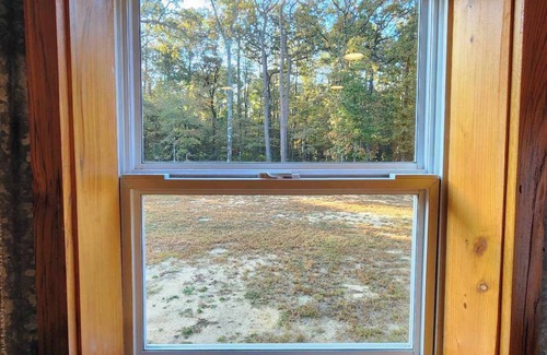 Fairbanks House | Hunters & Heroes Hideaway. Cozy barn studio in tranquil Loch Arbor area.