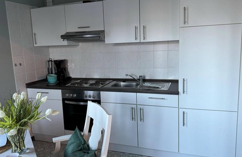 Westeraccumersiel Apartment | Huus Achterdiek - Erdgeschosswohnung "anker" mit Freundlicher Atmosphäre