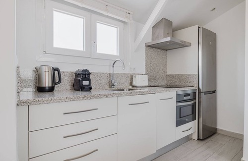 Castellana Apartment | Ideal Chueca Justicia 2BR w/Balcony, Elev & Doorman, by Blueground