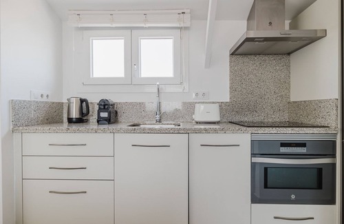 Castellana Apartment | Ideal Chueca Justicia 2BR w/Balcony, Elev & Doorman, by Blueground