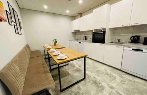 Raamsdonksveer Apartment | Ideal for group travel, this stylish new accommodation features twelve rooms.