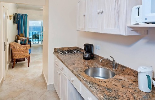 St. Lawrence Gap Hotel | Ideal Location! Onsite Pool, Kitchenette, Oceanfront, Free Parking, Near Beach