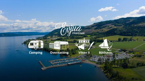 Ostre Toten Other | Idylliske Evjua ved Mjøsa