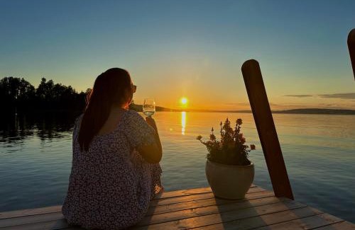 Ostre Toten Other | Idylliske Evjua ved Mjøsa