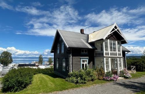 Ostre Toten Other | Idylliske Evjua ved Mjøsa