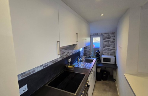 Dornumergrode Apartment | In a quiet residential area + fenced garden + free WiFi + by the sea + dogs welcome + modern furnishings