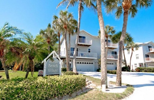 Holmes Beach House | In The Midst of Palms by AMI Locals