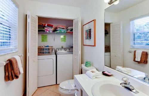 Holmes Beach House | In The Midst of Palms by AMI Locals