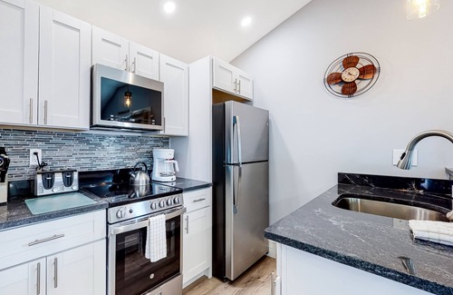 Wells Cottage | In-town cottage near the beach with marsh view, AC, saltwater pool, & hot tub