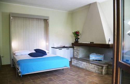 Aritzo Condo | Independent stone apartment in a holiday home with garden and barbeque