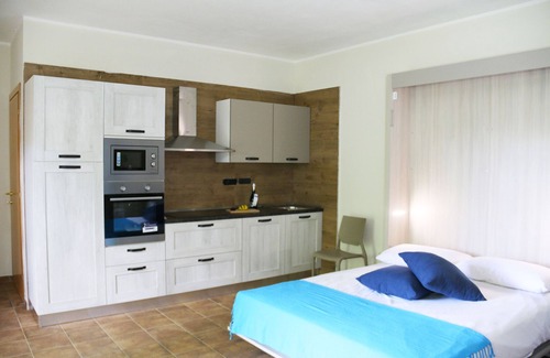 Aritzo Condo | Independent stone apartment in a holiday home with garden and barbeque