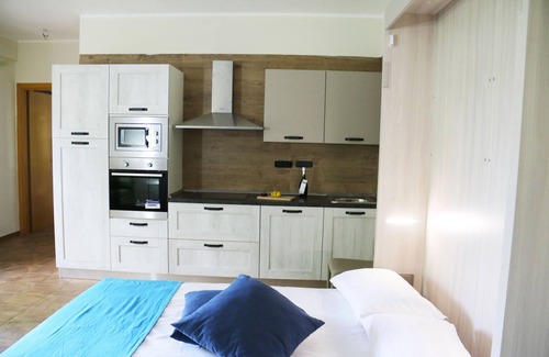 Aritzo Condo | Independent stone apartment in a holiday home with garden and barbeque