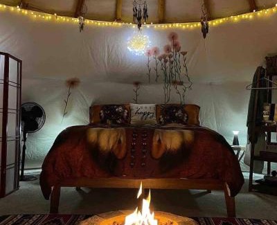 Leland Other | Indulge in the ultimate Glamping experience with our Luxury Tipi packages featuring four unique sites with private decks, indoor and outdoor fire pits, and exclusive access to 155 acres of private hiking trails