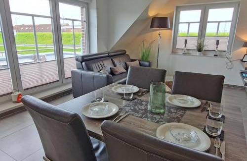 Norddeich Apartment | Inselblick am Kutterhafen - Erholung am Deich und Hafen f?r 2 Personen