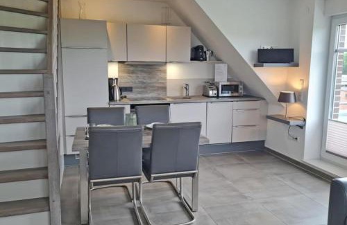 Norddeich Apartment | Inselblick am Kutterhafen - Erholung am Deich und Hafen f?r 2 Personen