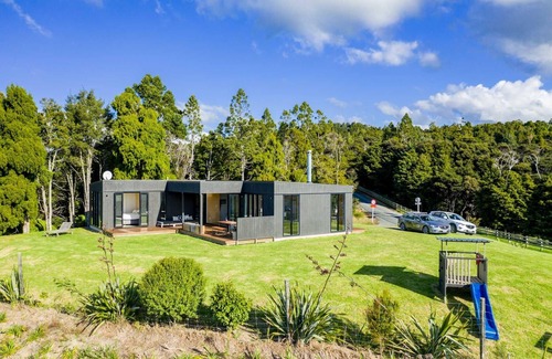 Mangawhai House | Island View - Designer holiday home with fabulous indoor outdoor living and spectacular views