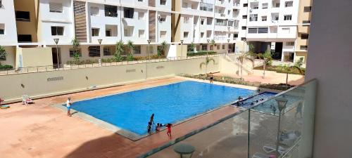 Cite Al Mohammadi Apartment | Islane vue piscine
