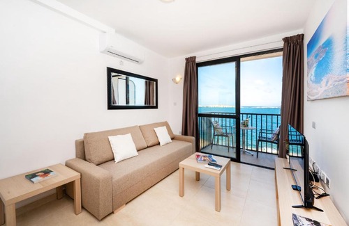 Bugibba Apartment | Islet Promenade Seafront Family Apartment with 2 balconies by Getawaysmalta