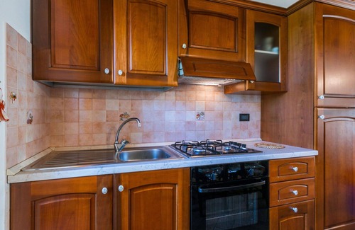 Castelnuovo di Val di Cecina Apartment | Cosy apartment for 12 guests with WIFI, pool, A/C, TV, patio and pets allowed