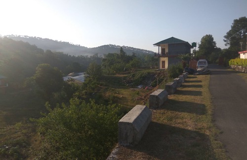Gopalpur Other | It is surrounded by lush green mountains, with fruit garden & vegetable fields.